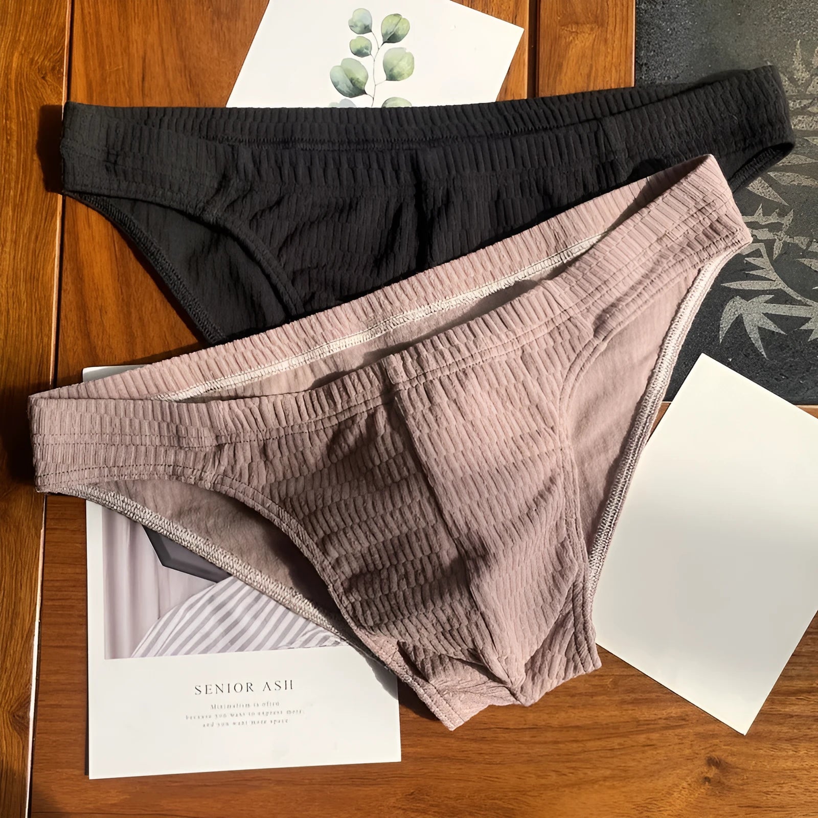 Men's triangle underwear in pure cotton with mid-waist design, available in skin colour, apricot, black, and white variations