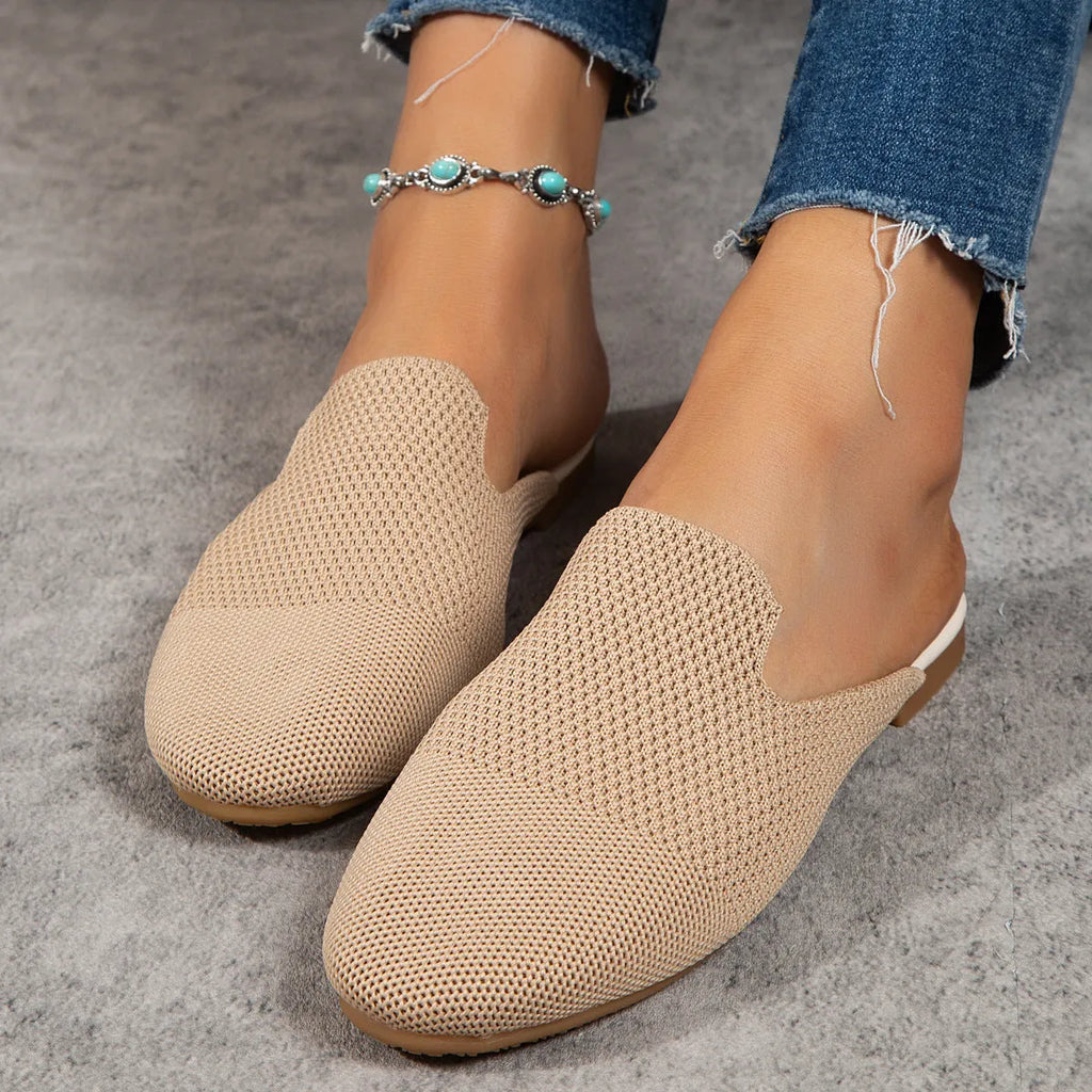 Mesh sandals in apricot colour with cloth upper and rubber sole, showing round toe slip-on design for leisure wear
