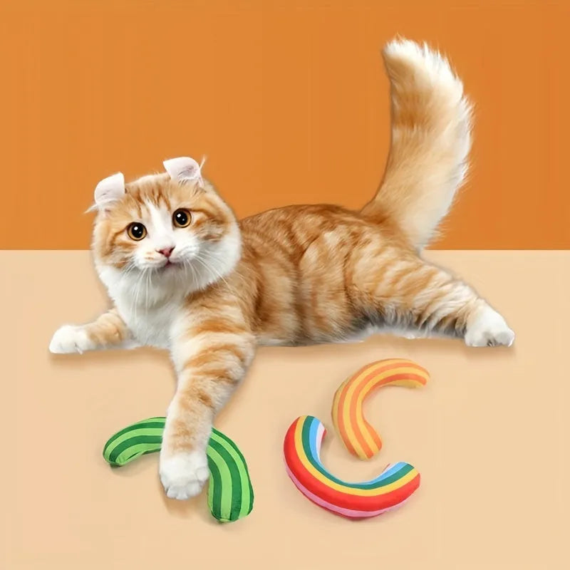 Striped pattern cat pillow toy with built-in catnip strip in green, rainbow, or yellow colour, measuring 23cm by 20cm