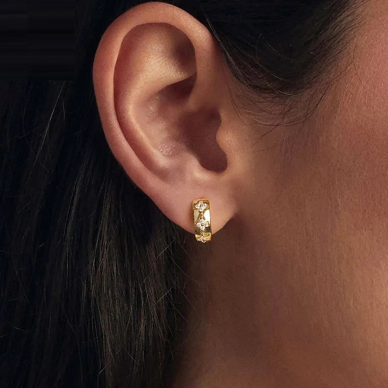 S925 sterling silver earrings with moissanite inlay and a three-petal grass design, unisex pair