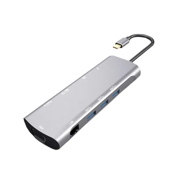 Grey USB-C docking station with HDMI, VGA, USB ports, and 140mm cable for laptop connectivity expansion