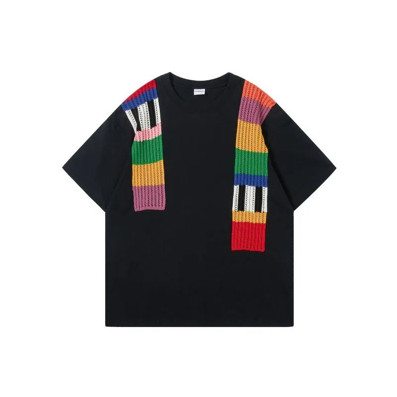 Cotton pullover with patchwork design showing letter patterns in loose fitting short sleeve style