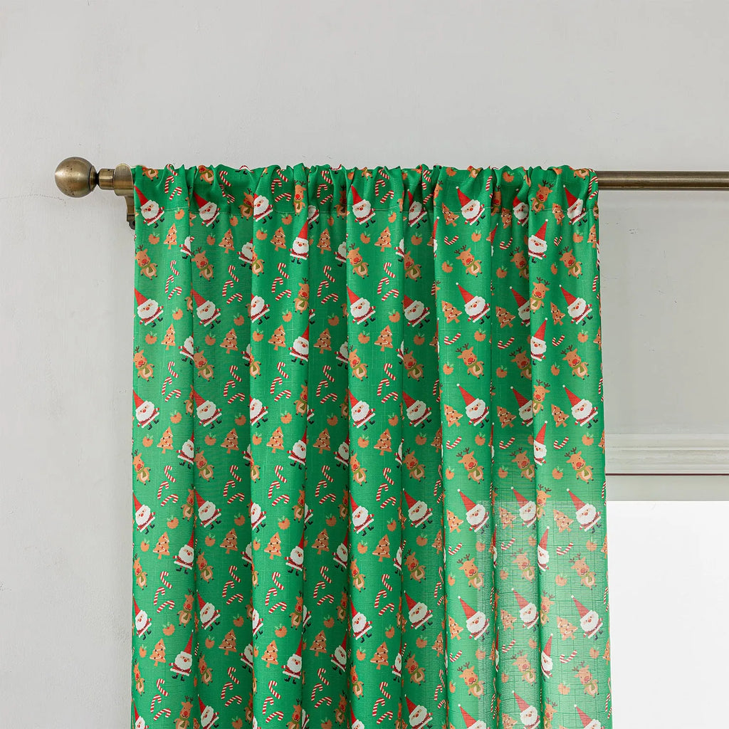 Christmas curtain with printed snowman and angel designs in green colour, 1 metre width