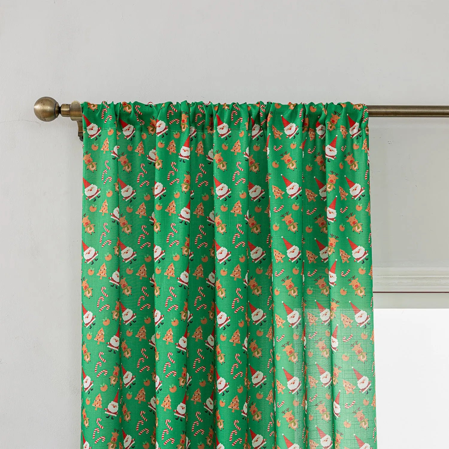 Christmas curtain with printed snowman and angel designs in green colour, 1 metre width