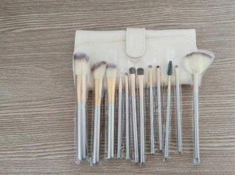 Persian makeup brush set with rice white bristles and champagne-coloured handles in 12, 18, or 24-piece options