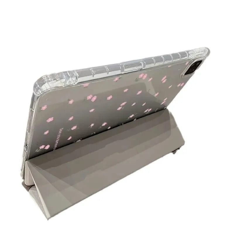 Transparent floral tri-fold protective case for Apple iPad showing magnetic bracket function