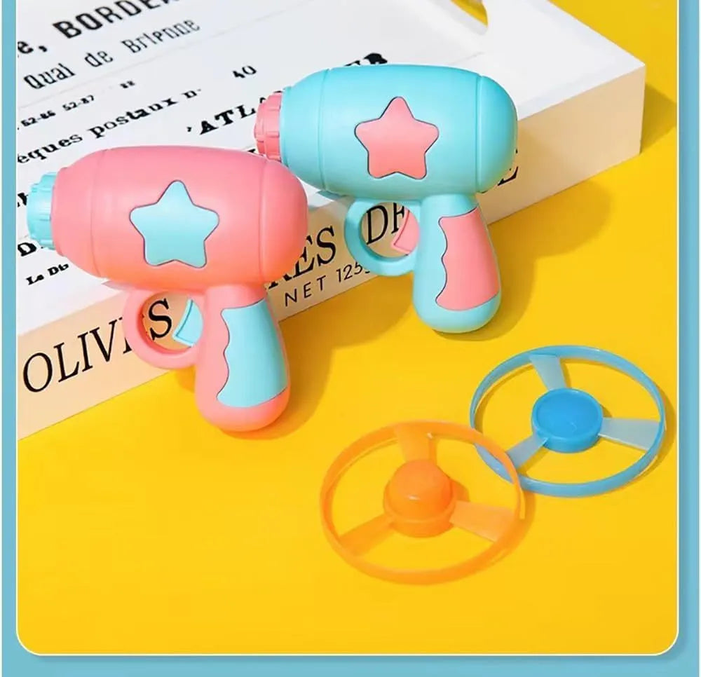 Blue and pink plastic cat toy gun with frisbee measuring 11cm long 10.5cm wide 7.5cm high