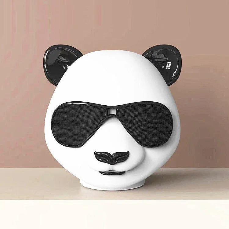 Portable mini Bluetooth speaker with classic style design showing USB port for charging