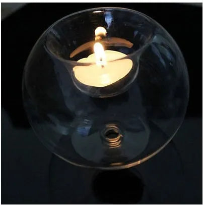 Handmade round hollow glass candle with spherical design, 7.5-10.0cm diameter range, clear transparent glass