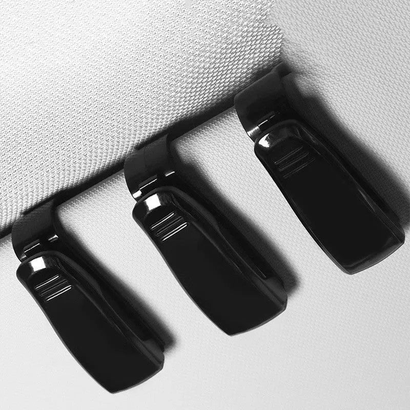 Black plastic car clip for sunshades, holding glasses and tickets, 6.5cm long