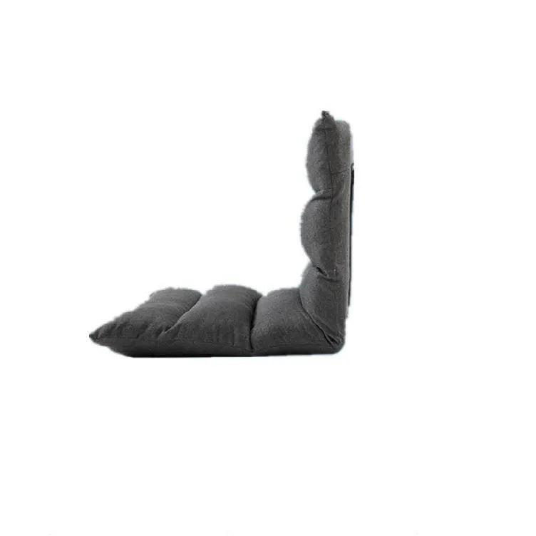 Beige adjustable backrest lazy sofa floor chair folded flat showing fabric texture and reclining mechanism