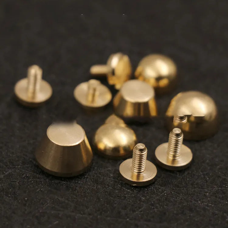Brass decorative buckle for footwear showing 10x6mm and 12x7mm sizes in round and geometric shapes