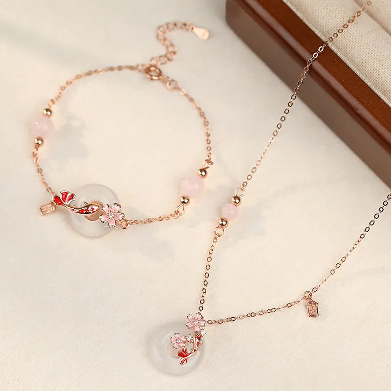 S925 sterling silver bracelet with white chalcedony crystal flower and engraved koi fish design.