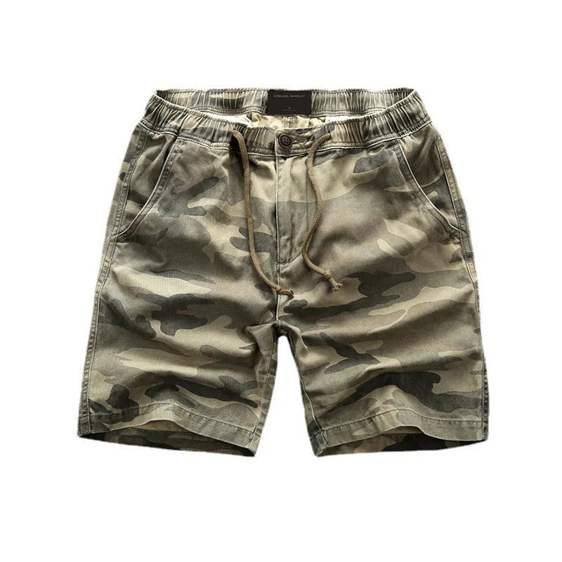 Cotton workwear shorts in camouflage pattern with mid-waist and zip fly design