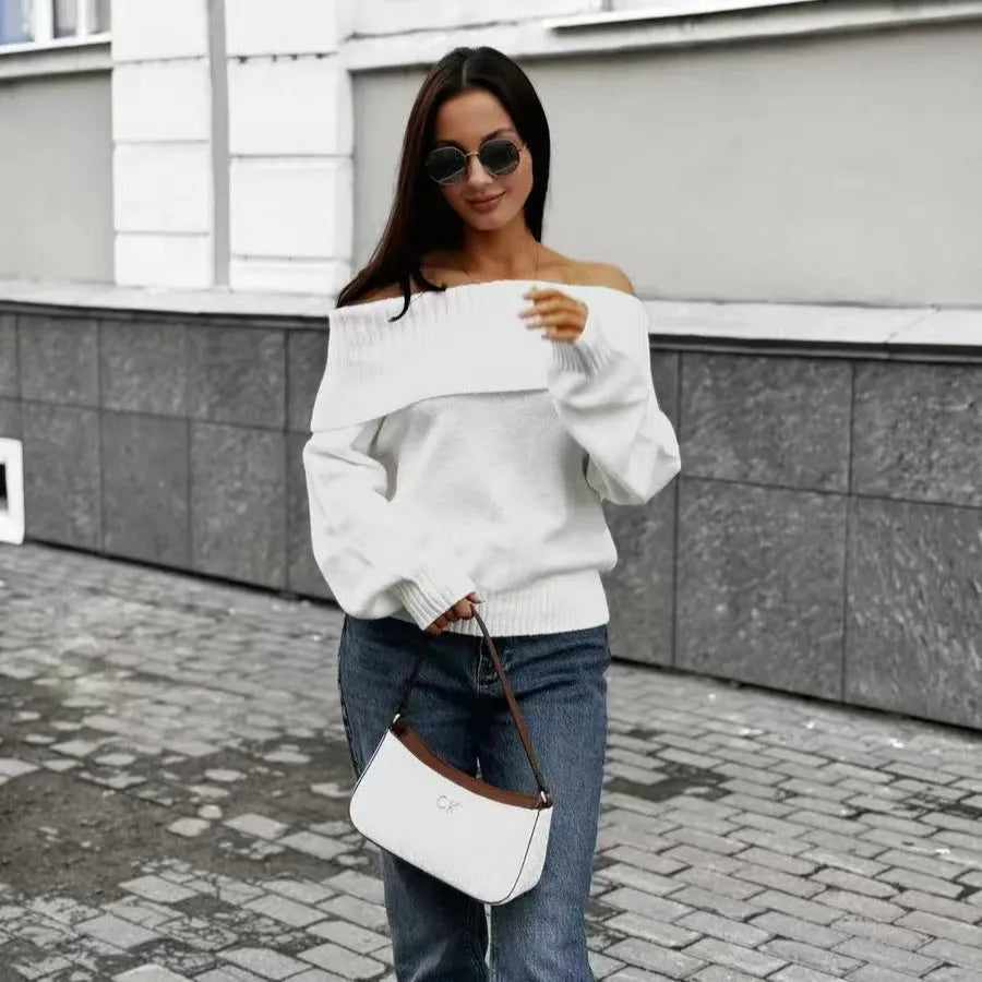 Off-the-shoulder grey sweater with 3D pattern and strapless design, showing regular sleeves and pullover style