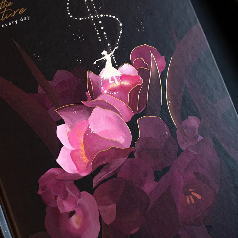 A5 notebook with luminous cover in Deep Blue, open to show colour illustration pages, size 21 x 14.8 cm