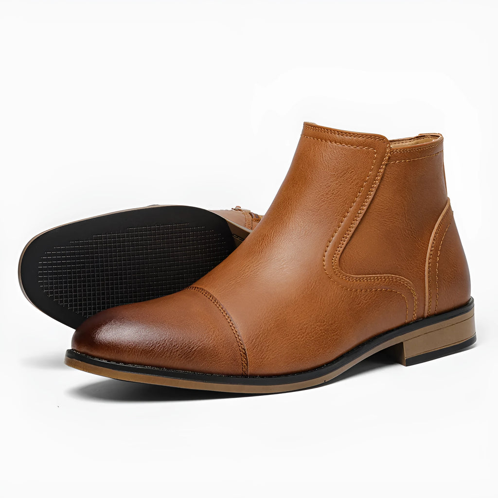 Men's plus size brown Chelsea ankle boot with a side zip, round toe, and low wooden sole.