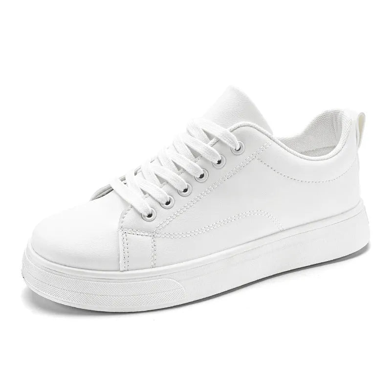 Men's low-top casual sneakers in black with white sole, showing round toe and flat heel design.