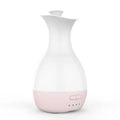 White ultrasonic aromatherapy humidifier with colourful LED night light and 200ml water tank capacity