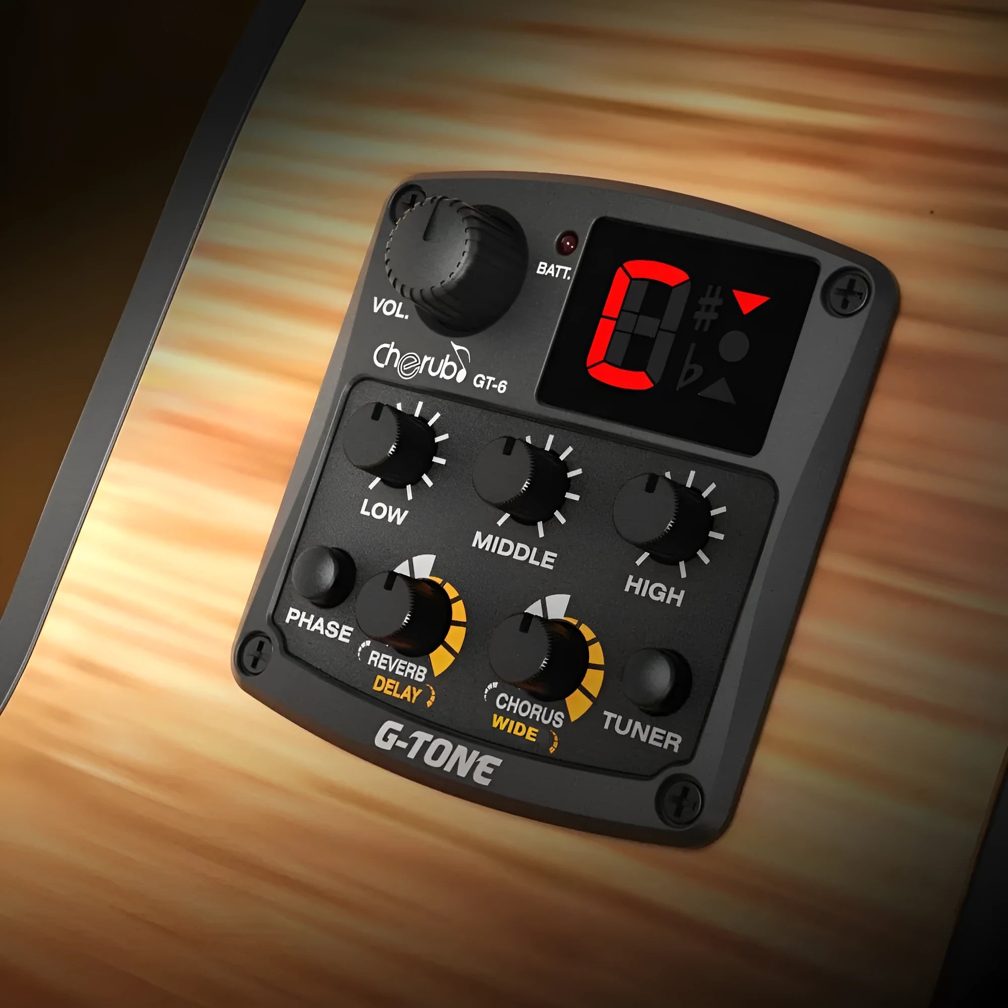 Cherub GT-6 black acoustic guitar soundhole pickup and EQ unit with control knobs.