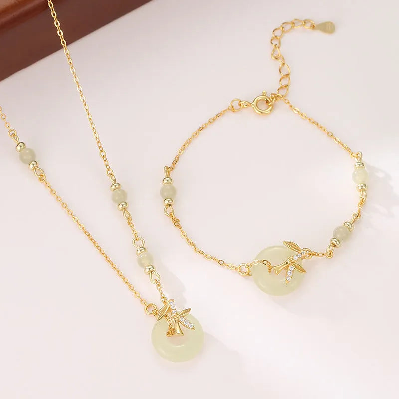 Women's Hetian jade bracelet with Peace Buckle clasp in antique style, made from 925 silver