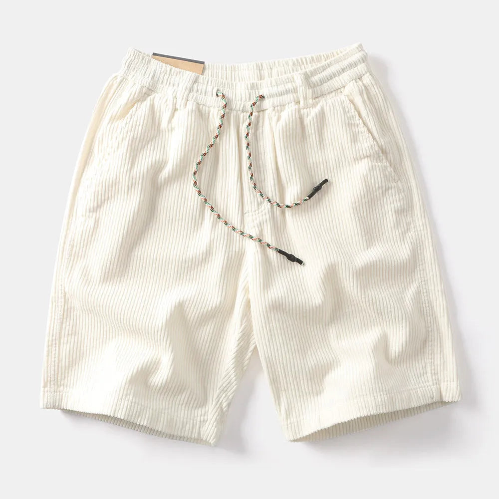 Men's khaki cargo shorts with multiple utility pockets, straight-leg design, and retro American-style detailing