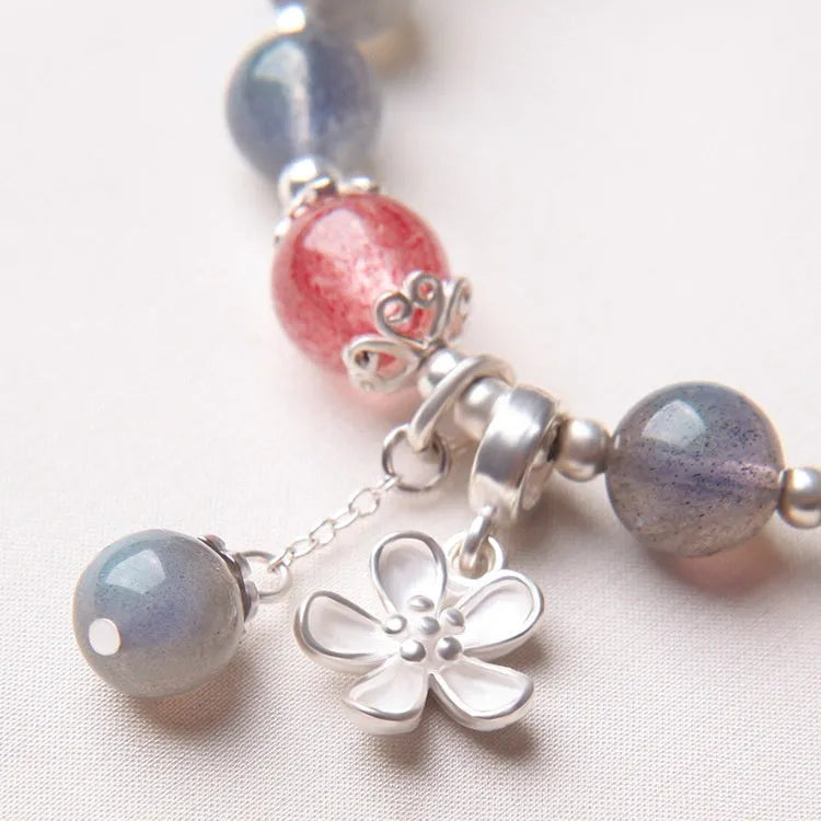 Women's 7.5mm crystal bracelet with zodiac charms and 925 silver clasp in moonlight lime or strawberry pink