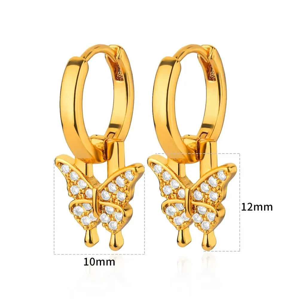 Women's irregular geometric butterfly earrings in copper with diamond treatment, showing heart-shaped and star design elements