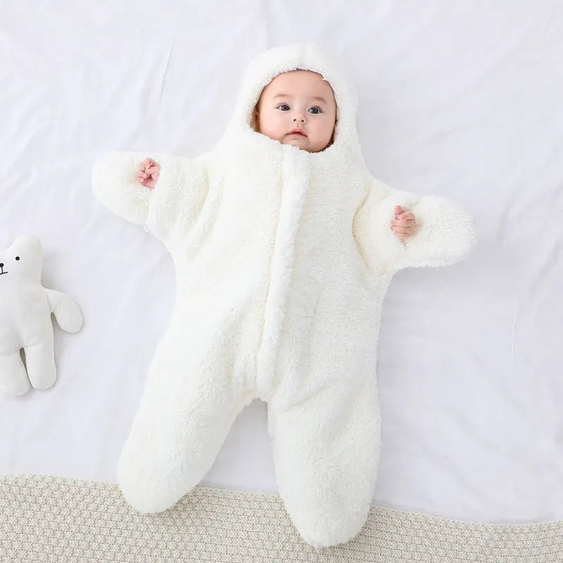 Hooded baby sleeping bag in cashmere cotton fabric with zip opening and hand cuffs