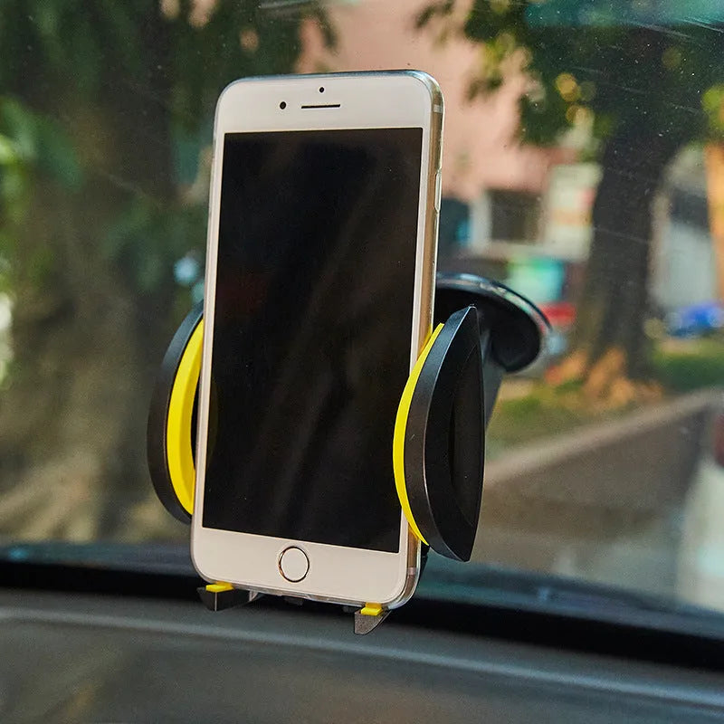 Blue U-shaped mobile phone bracket with suction cup mount showing clamp arms open for device insertion