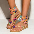 Ethnic style beaded petal sandals with round toe design and floral decorations in suit colour