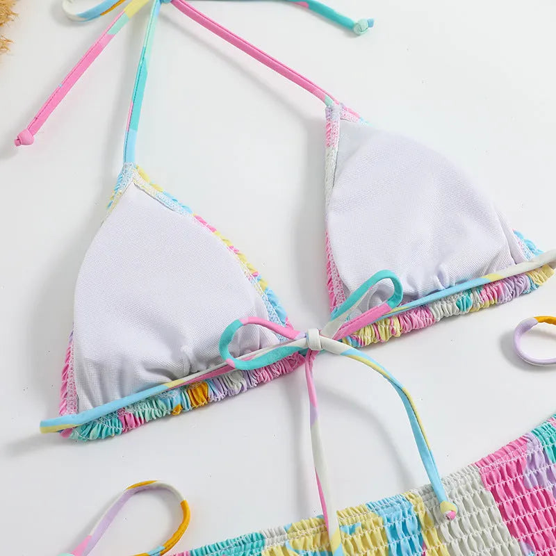Women's multicolour floral triangle bikini with smocking detail on the top and briefs bottom.