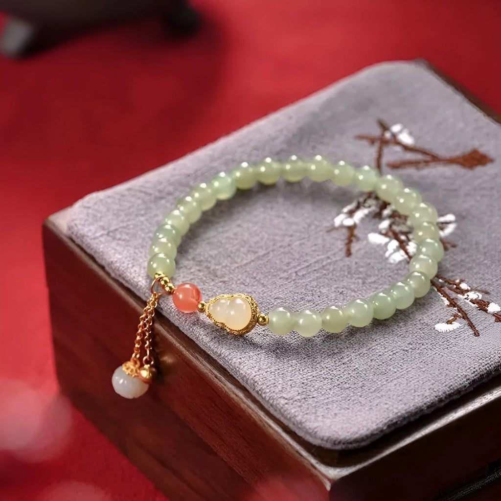 Qingshui jade women's bracelet with fu character and gold gourd motif, 6mm gold plated beads