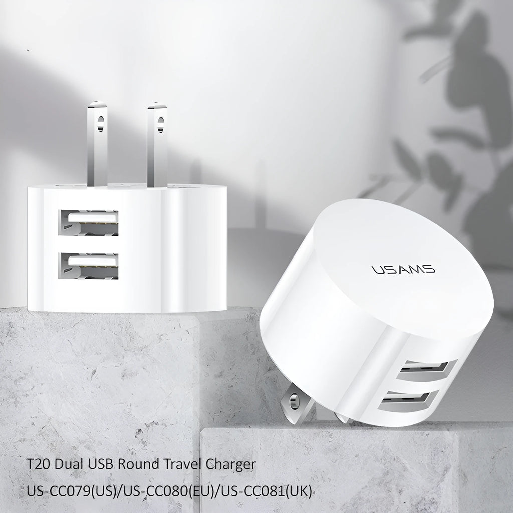 White portable USB phone charger with universal international adapter for UK US and EU power sockets
