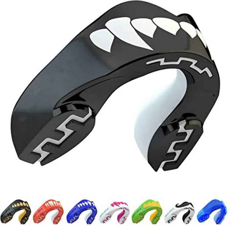 Adult boxing mouthguard with tooth socket design in black/white colour variant showing printed teeth pattern