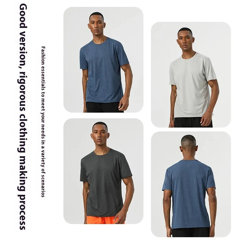 Man wearing a lightweight dark gray short sleeve sports top with reflective details on the sleeves.