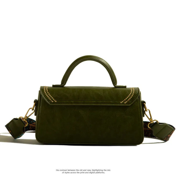 Brown retro messenger bag with square vertical shape, sandwich pocket, and internal phone compartment, measuring 23cm by 8cm by 12.5cm