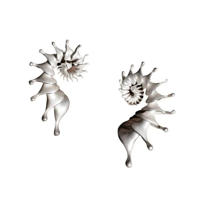 Exaggerated conch three-dimensional matte earrings with irregular shape elements and alloy construction