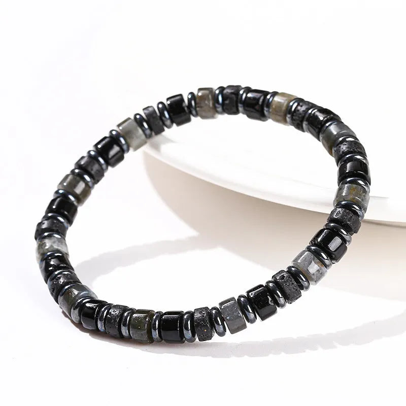 Natural hematite and volcanic rock bead bracelet for men with 6mm geometric beads.