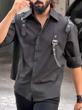 Men's black button-up utility shirt with regular fit, made from polyester, shown in a front view for daily wear