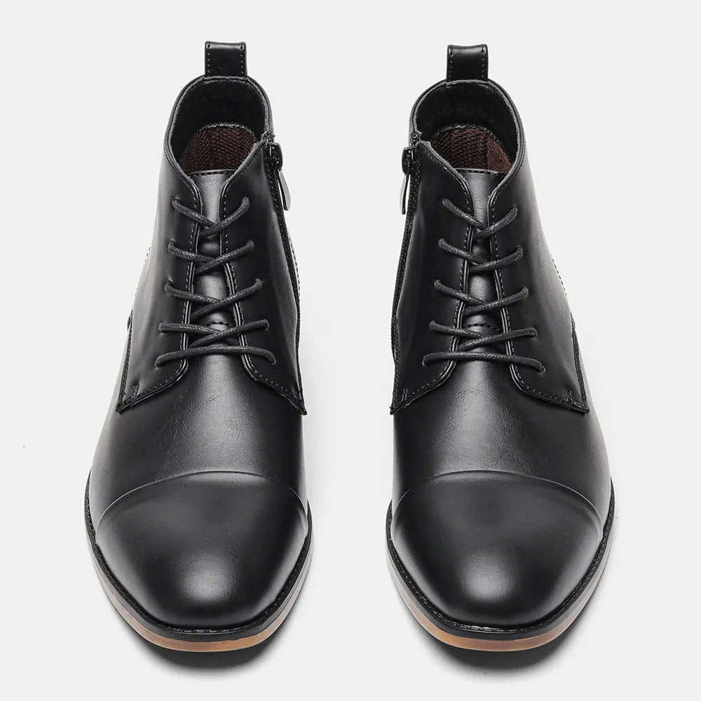 Men's plus size brown Chelsea ankle boot with a side zip, round toe, and low wooden sole.