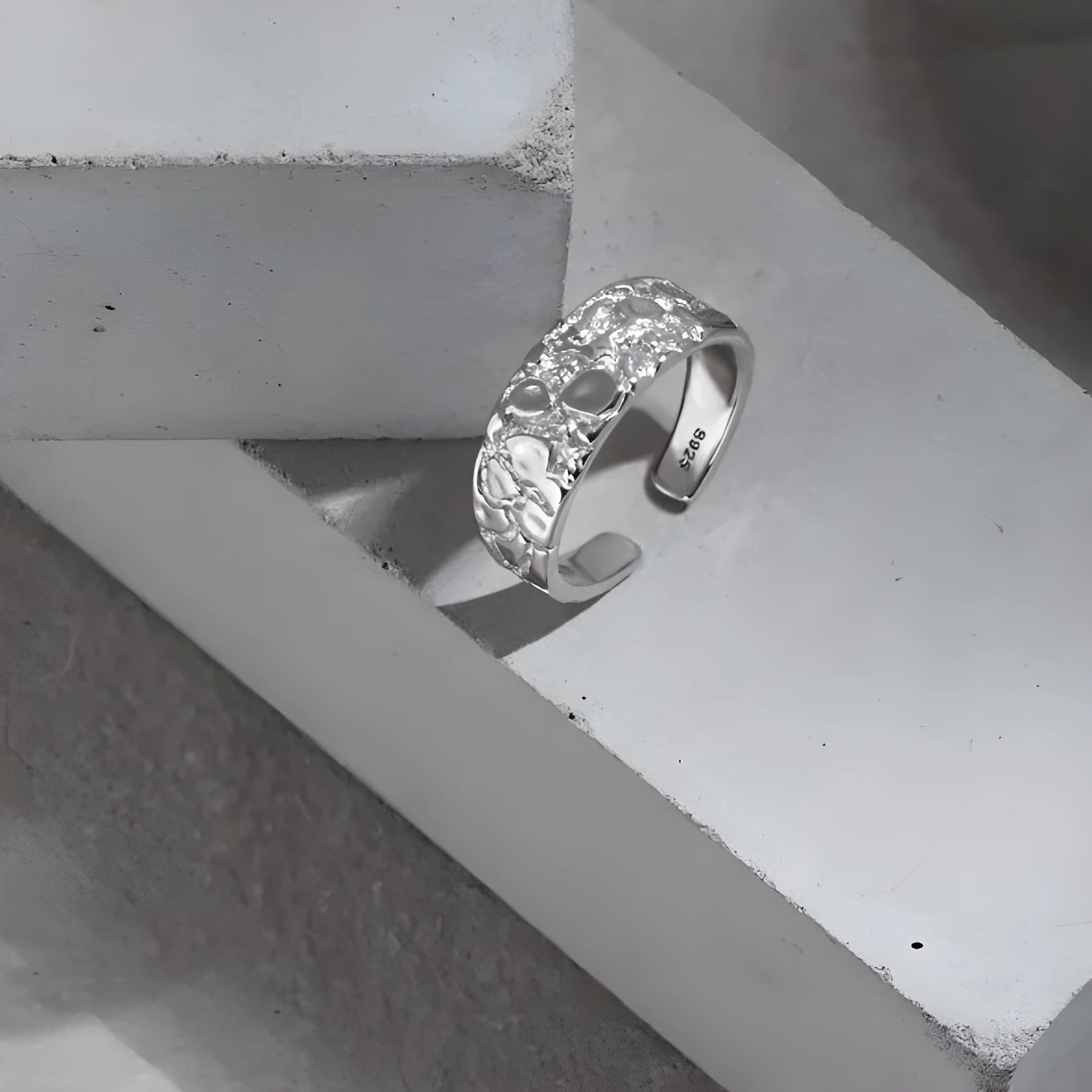 Adjustable opening silver ring with hammered texture in white gold colour finish