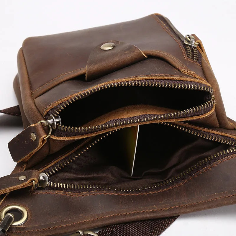 Crazy horse leather satchel bag with adjustable shoulder strap showing 30cm wide structured compartment