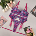 Rose red women's embroidered bikini set on a white background