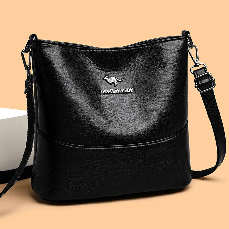 PU bucket bag 23.5x22x12cm with polyester lining and sandwich pocket in black, red, or yellow