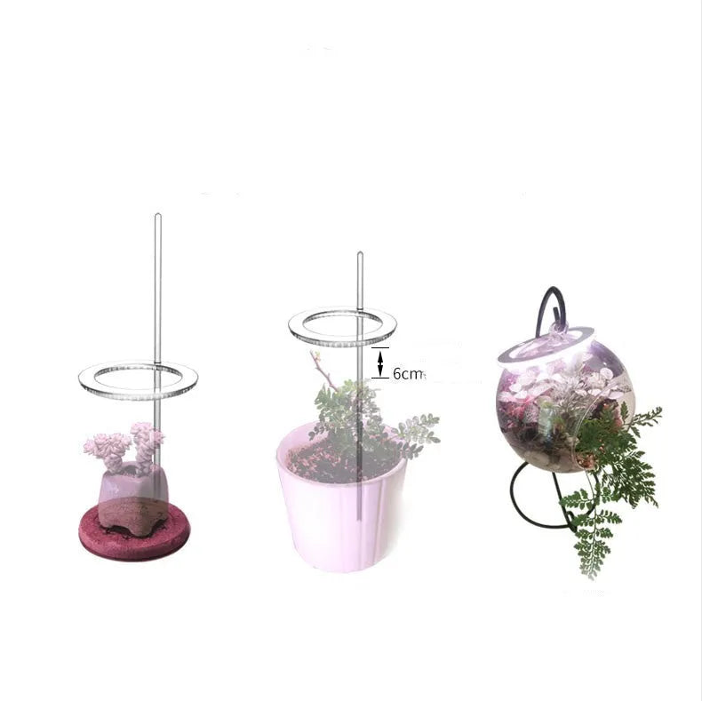 USB-powered LED grow light with transparent housing showing yellow LEDs, attached to 25cm acrylic stick for plant illumination