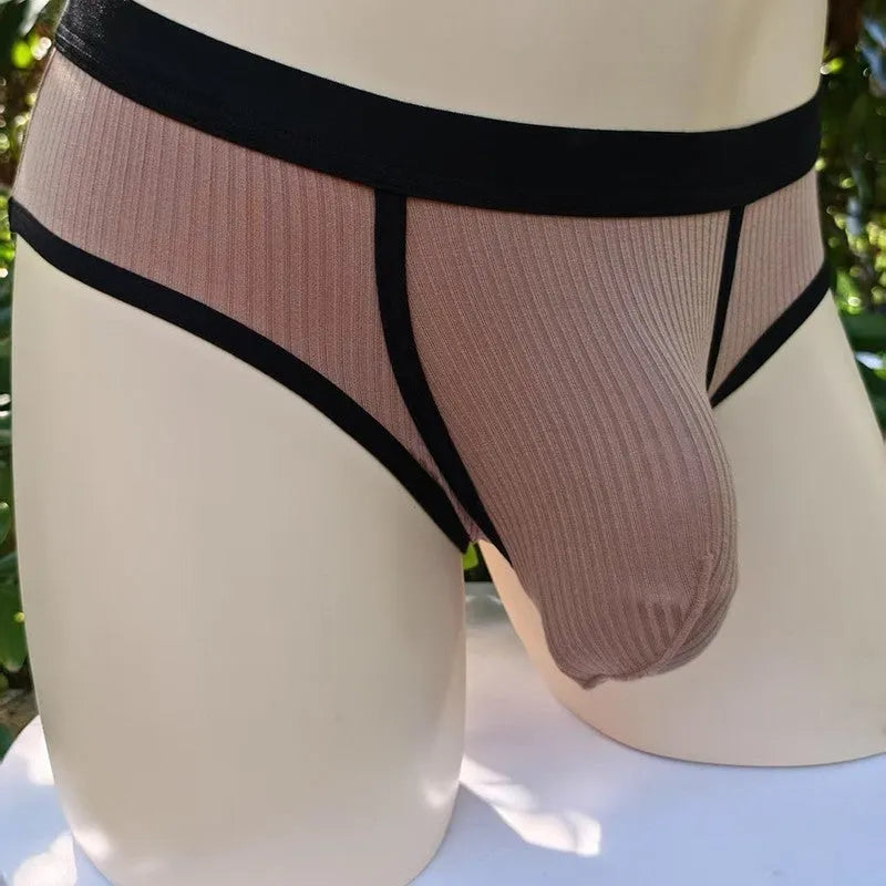 Men's solid colour briefs in viscose fabric with U-shaped design and low waist construction
