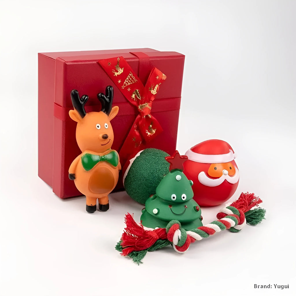 Seven sets of Christmas-themed vinyl dog toys including barbells, balls, ropes, and Santa figures.