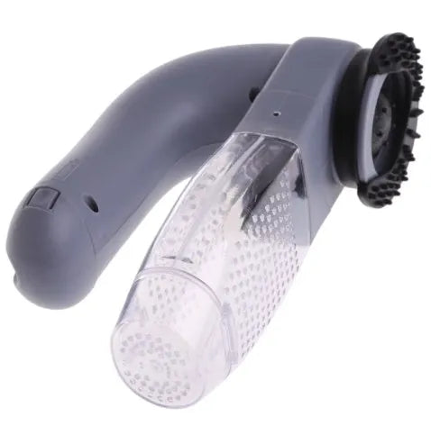 Grey portable pet hair vacuum cleaner and massage brush for dog and cat grooming on sofa