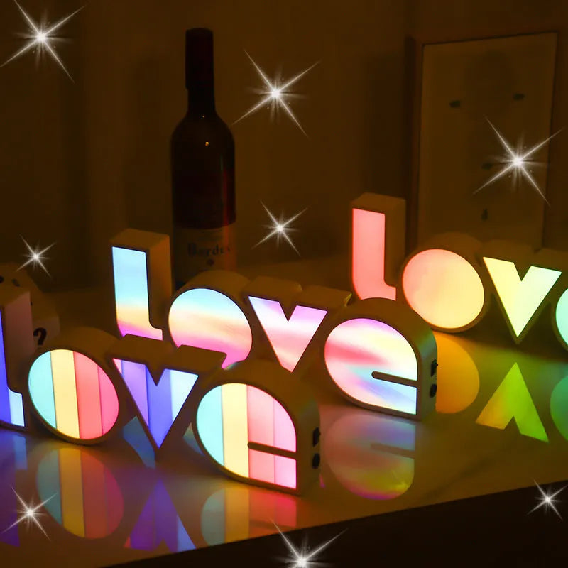 Valentine's Day LED LOVE light with rainbow-style plastic shade, measuring 35.5cm, for romantic room decor